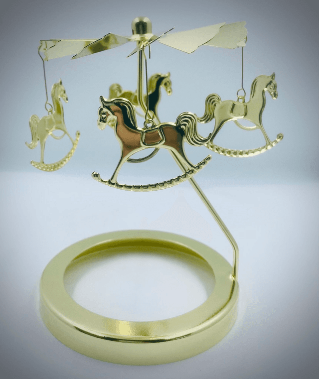 Carrousel porte-bougie chevaux à bascule dorés